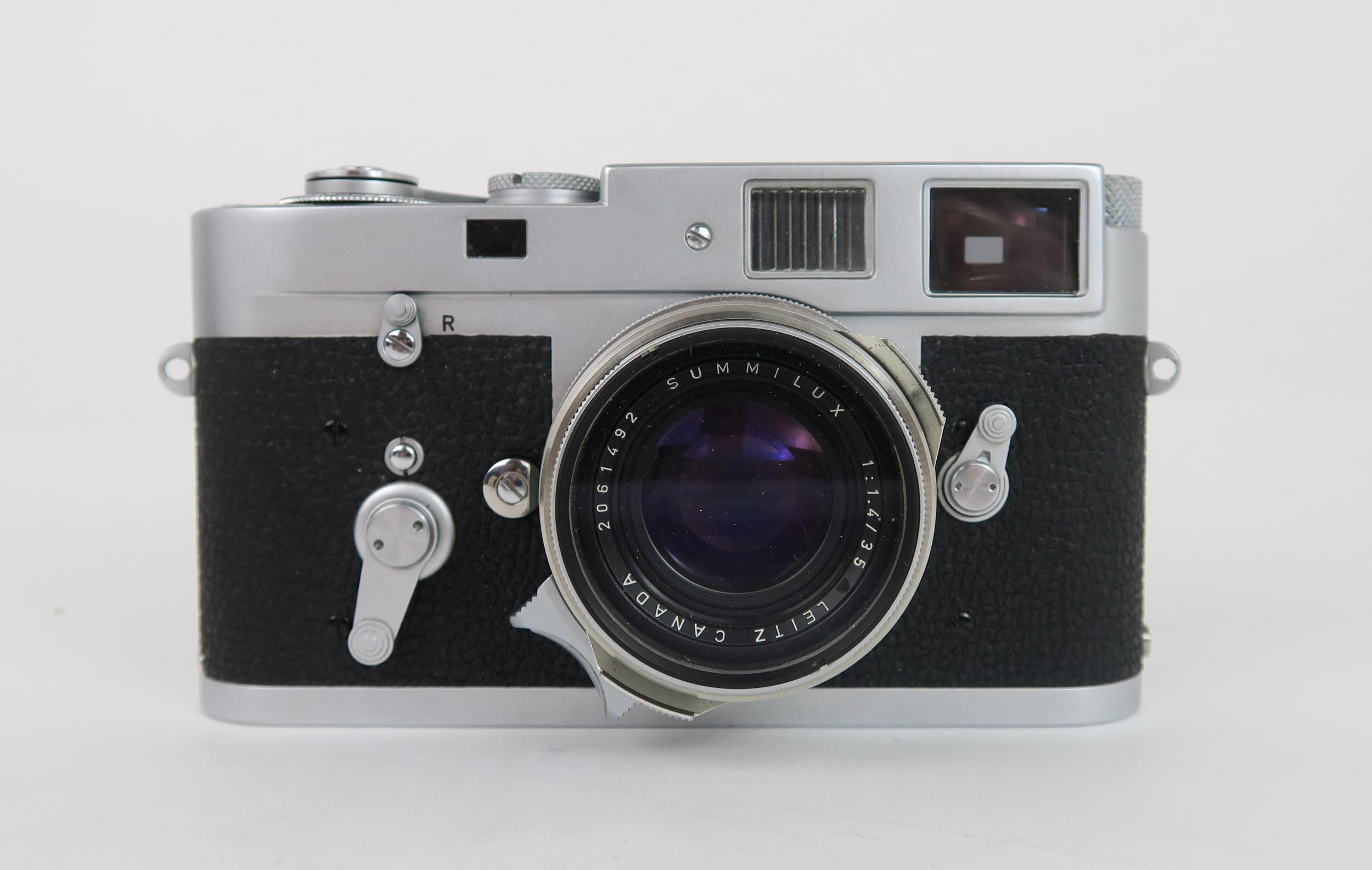 A 1964 LEITZ LEICA M2 RANGEFINDER CAMERA FITTED WITH A LEITZ SUMMILUX 1:1.4/35 LENS Serial no.