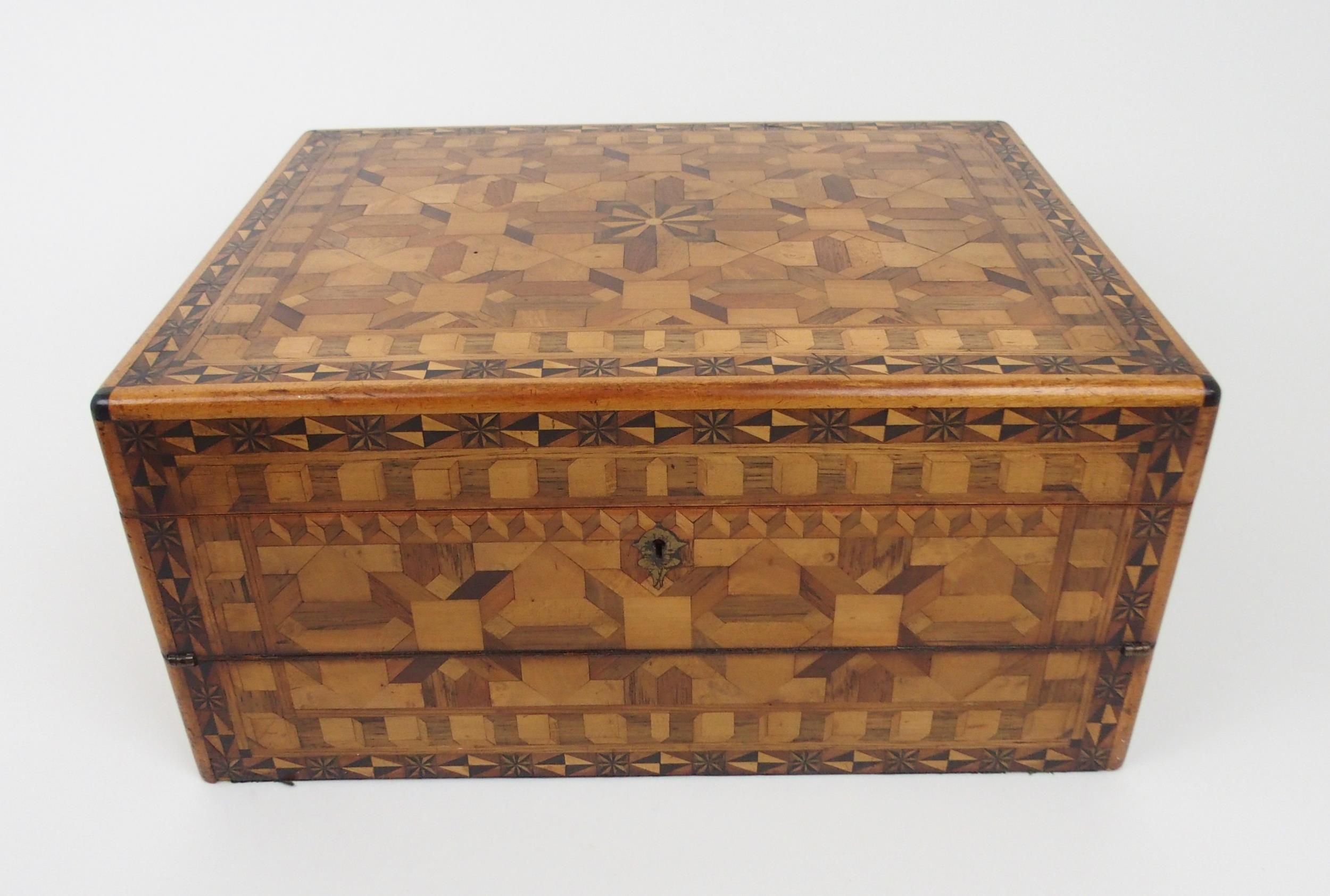 AN INTRICATE PARQUETRY-INLAID SPECIMEN WOOD WRITING SLOPE BY JOHN WALLACE OF GLASGOW With an