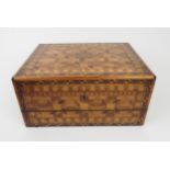 AN INTRICATE PARQUETRY-INLAID SPECIMEN WOOD WRITING SLOPE BY JOHN WALLACE OF GLASGOW With an