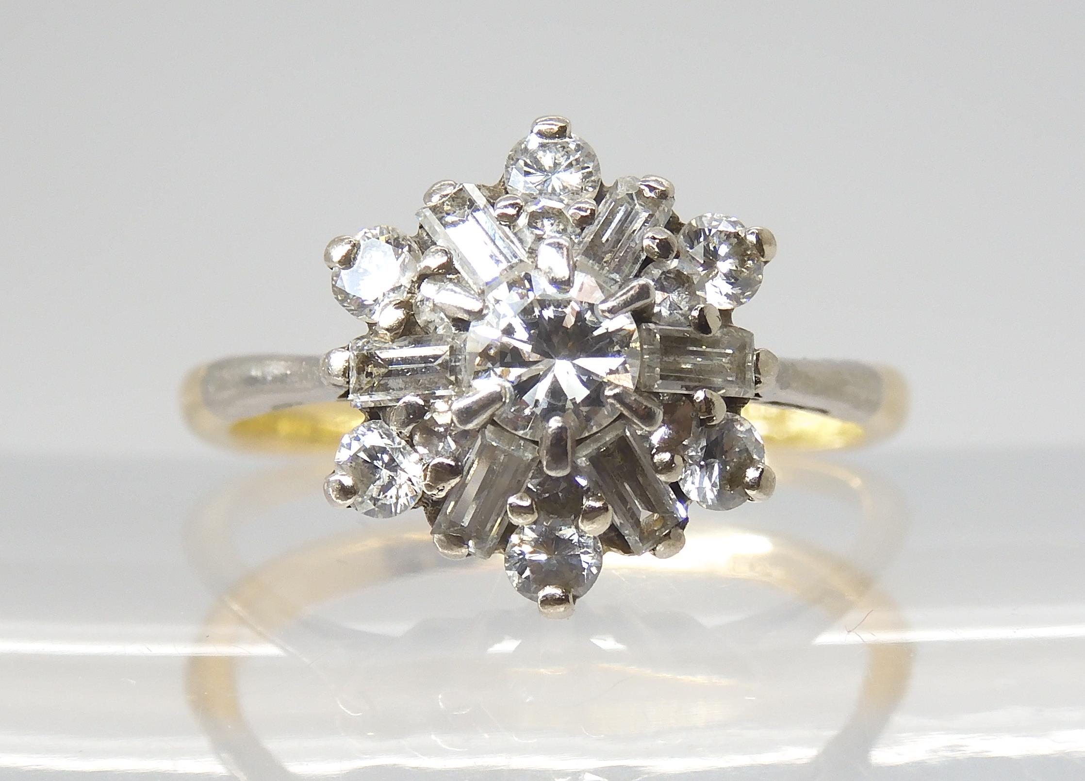 A DIAMOND CLUSTER RING set with estimated approx 0.68cts of brilliant and baguette cut diamonds, set - Image 2 of 5