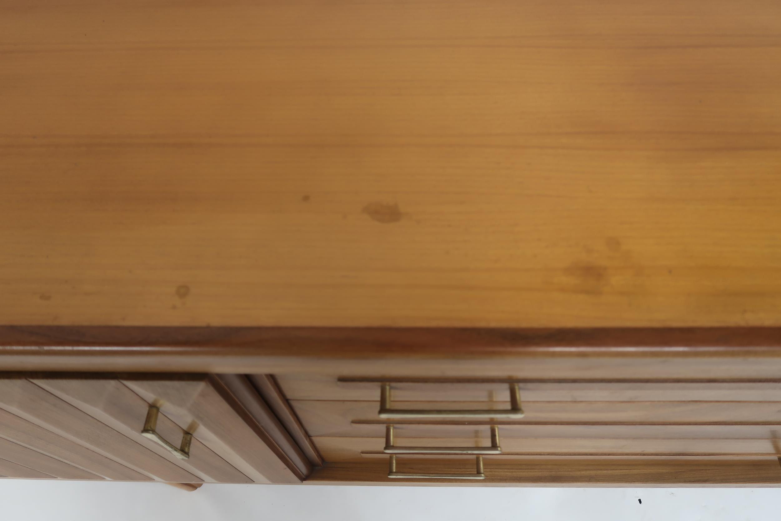 A MID 20TH CENTURY TEAK SIDEBOARD with three long central drawers flanked by cabinet doors with - Image 10 of 12