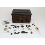A ROSEWOOD CORRESPONDENCE BOX, CONTAINING A COLLECTION OF ARCHAEOLOGICAL FINDS The hinged top with