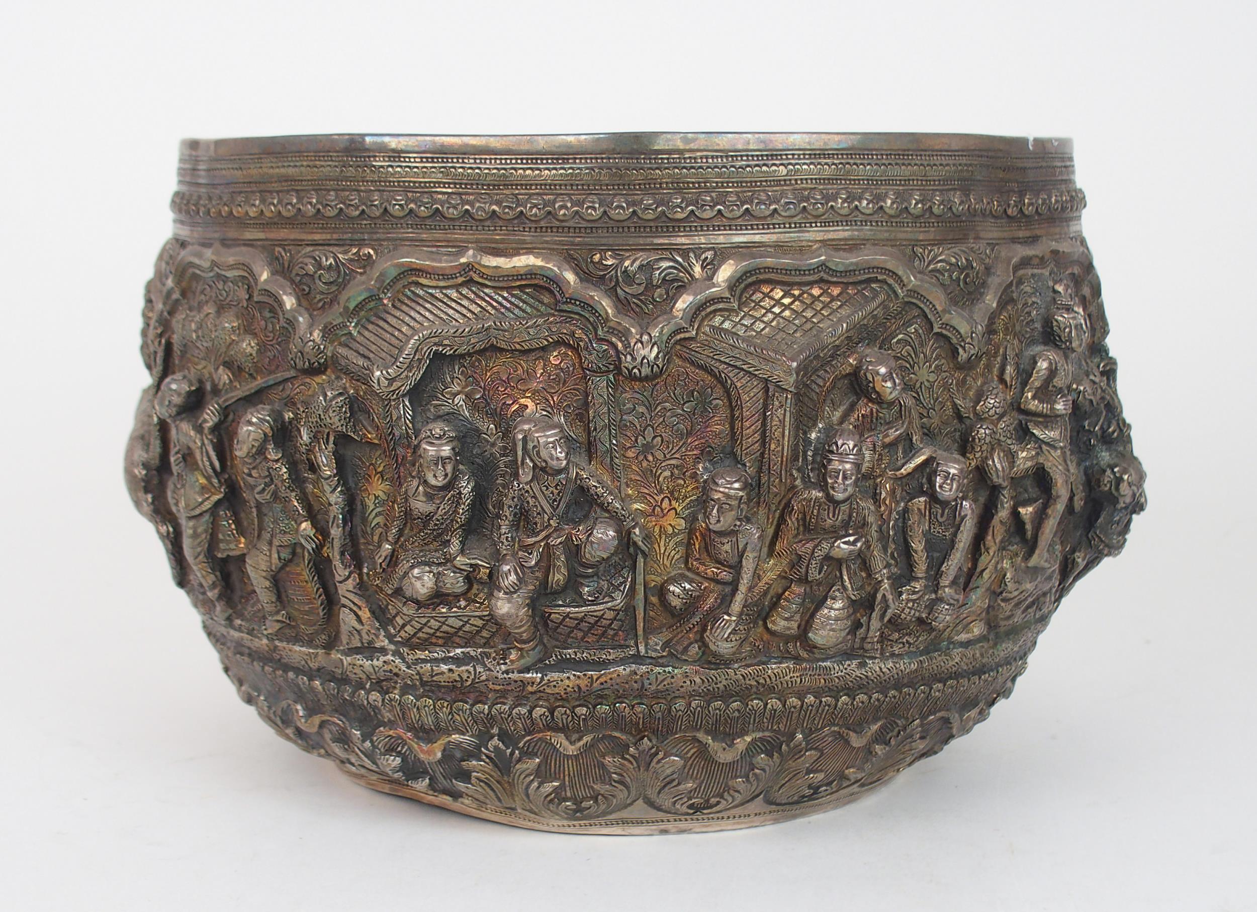 A BURMESE SILVER BOWL of rounded form, with profusely embossed and repousse work of villagers, - Image 4 of 13