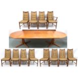 A MID 20TH CENTURY TEAK DINING SUITE comprising large D end twin pedestal dining table, 73cm high