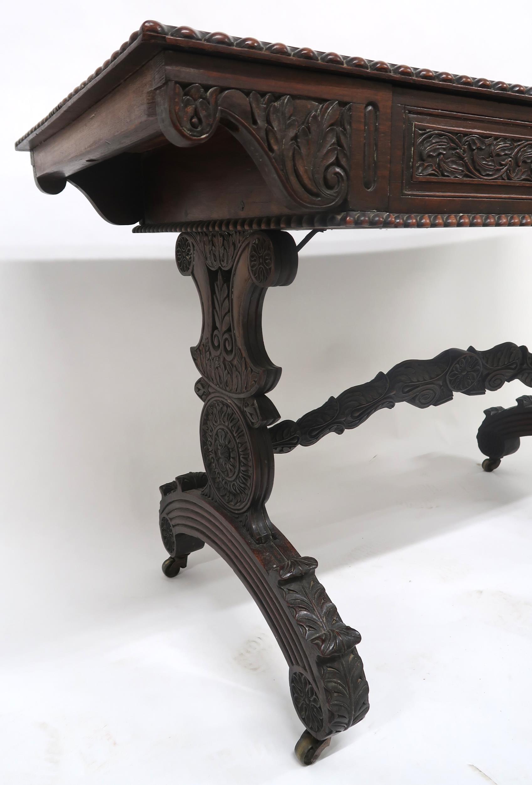 AN ANGLO-INDIAN ROSEWOOD LIBRARY TABLE with rectangular gadrooned top over a pair of asymmetrical - Image 4 of 13