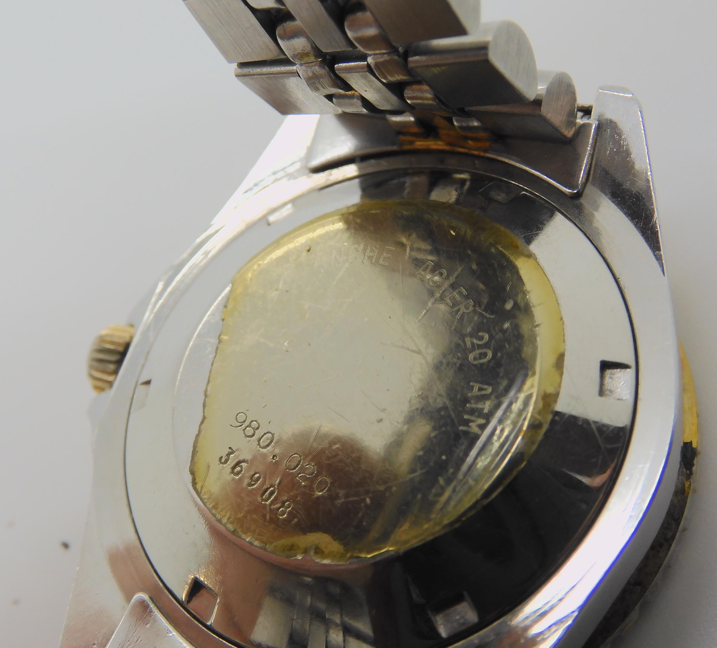 A VINTAGE HEUER WRISTWATCH circa 1983, steel and gold plate diver's watch.  The watch has a black - Image 6 of 11