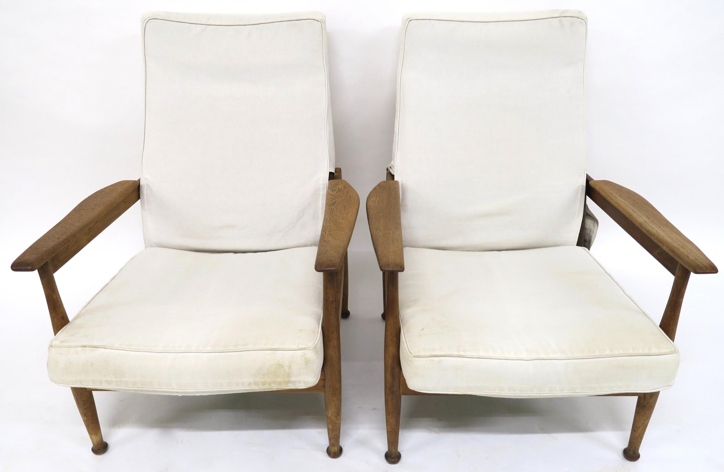 A PAIR OF GEORGE FEJER AND ERIC PAMPHILON FOR GUY ROGERS "MANHATTAN" RECLINING ARMCHAIRS with