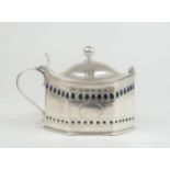 A GEORGE III PROVINCIAL SILVER MUSTARD POT  by Christian Keir Reid, Newcastle c.1810, of octagonal f