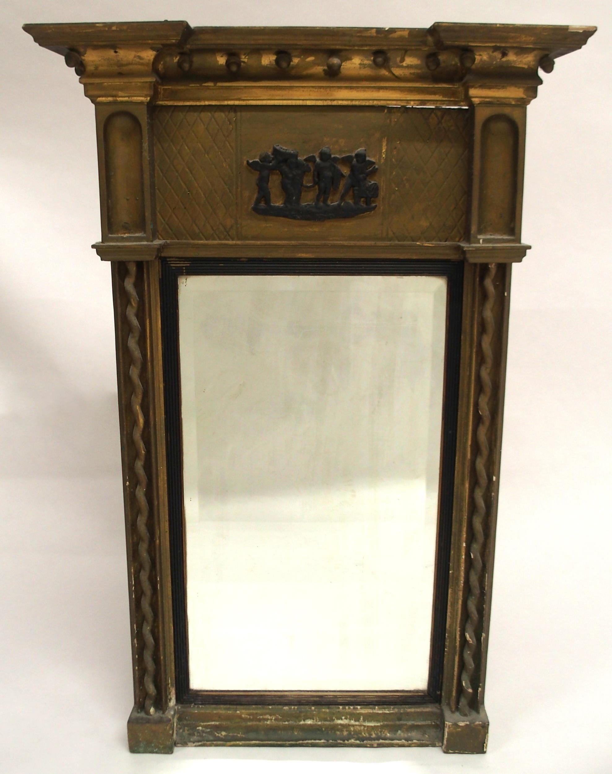 A REGENCY GILTWOOD GESSO FRAMED BEVELLED GLASS WALL MIRROR with moulded cornice with applied ball