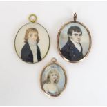 A GROUP OF THREE EARLY 19TH CENTURY PORTRAIT MINATURES  Painted on ivory, depicting respectively a