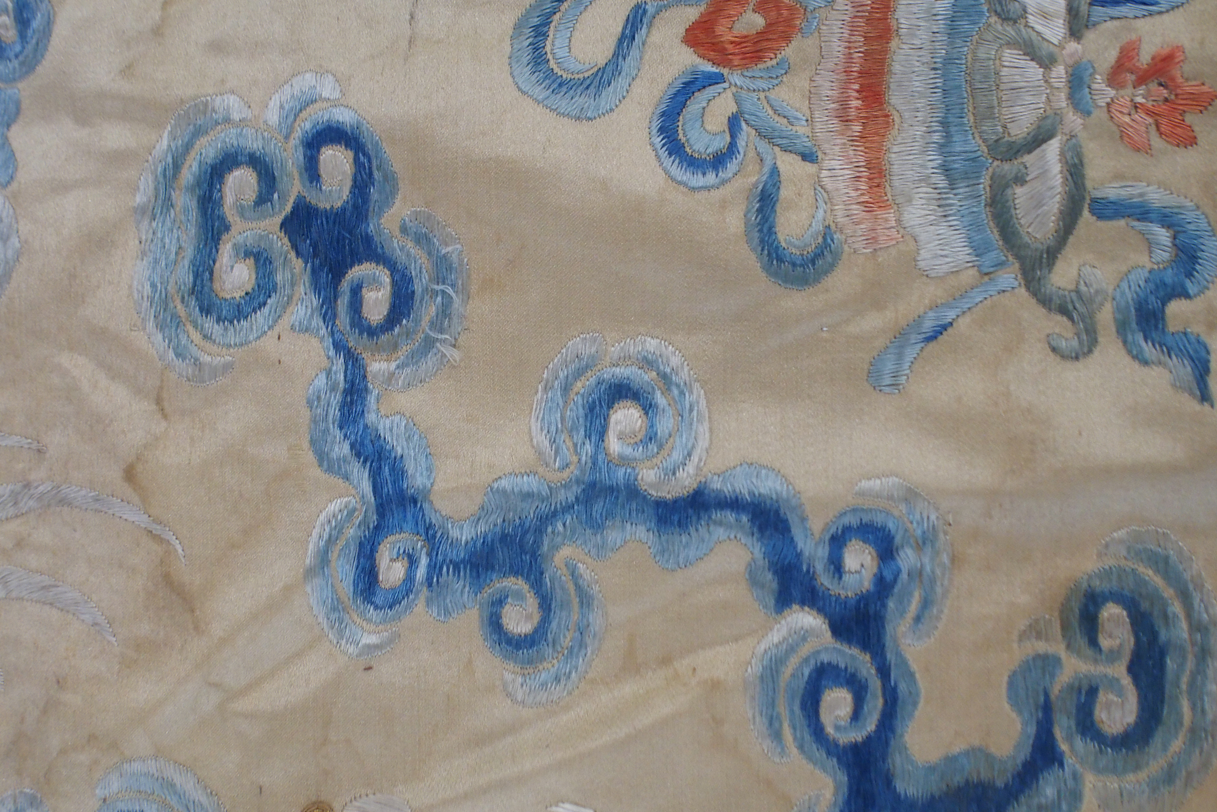 A CHINESE SILK PANEL decorated in coloured threads on a cream ground within a blue and white - Image 21 of 27