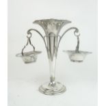 A GEORGE V SILVER EPERGNE by Elkington & Co, Birmingham 1921, fully marked to the baskets, the