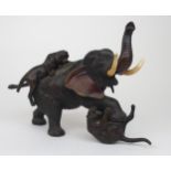A JAPANESE BRONZE MODEL OF AN ELEPHANT AND TIGERS  the roaring animal attacked by two tigers,