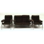 A MID 20TH CENTURY CHROMED FRAMED THREE PIECE SUITE comprising two seat sofa, 77cm high x 114cm wide