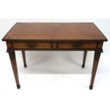 A CONTINENTAL LOUIS XVI STYLE KINGSWOOD BUREAU PLAT with parquetry inlaid top with gilt metal edge