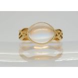 AN UNUSUAL SHETLAND GOLD MOONSTONE RING with 9ct gold Celtic knotwork band, fully hallmarked for