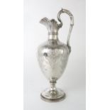 A VICTORIAN SILVER EWER by Edward & John Barnard, London 1855, of baluster form, the body engraved