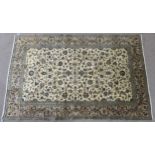 A CREAM GROUND KASHAN RUG with all over floral ground and flower head border, 297cm long x 194cm