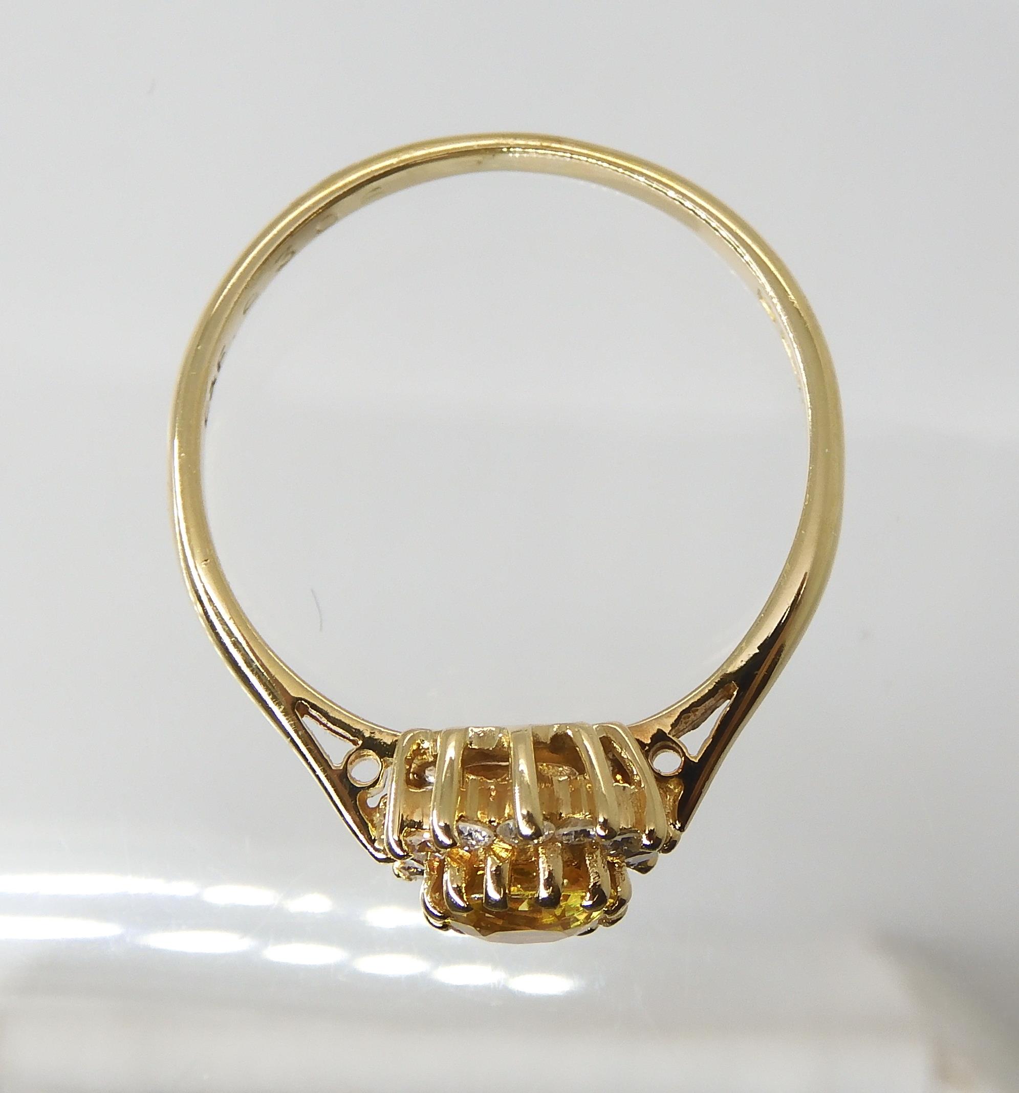A YELLOW SAPPHIRE AND DIAMOND CLUSTER RING set throughout in 18ct yellow gold, finger size N, weight - Image 2 of 3