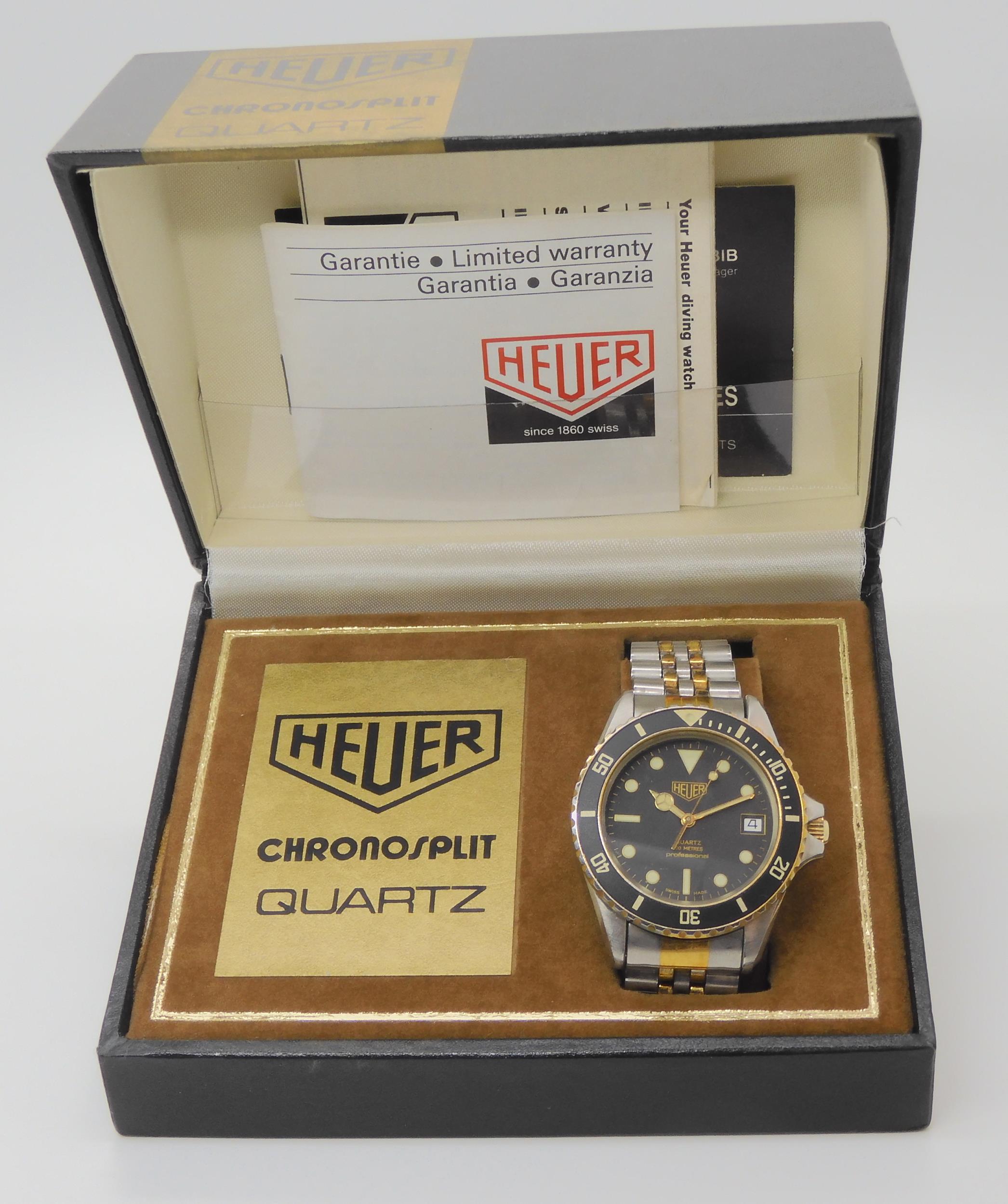A VINTAGE HEUER WRISTWATCH circa 1983, steel and gold plate diver's watch.  The watch has a black - Image 8 of 11