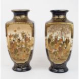 A PAIR OF SATSUMA SQUARE SHAPED VASES  painted with panels of figures at various pastimes surrounded