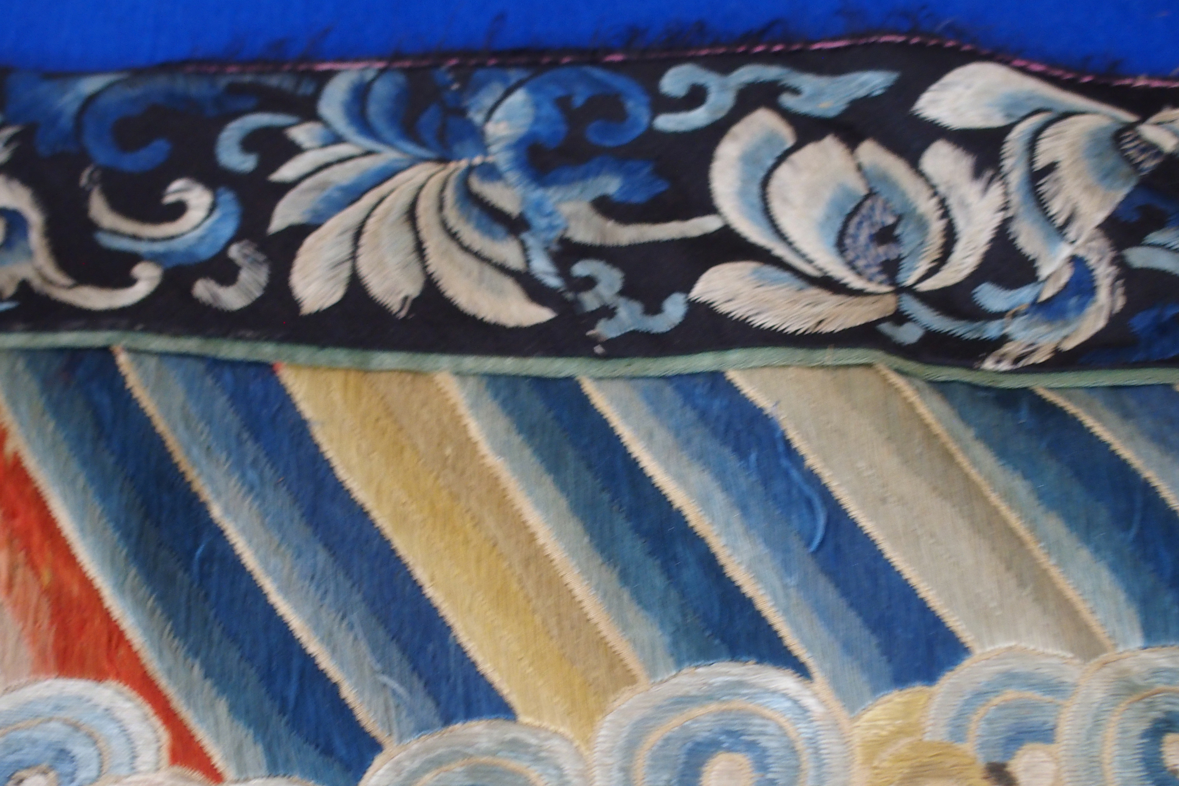 A CHINESE SILK PANEL decorated in coloured threads on a cream ground within a blue and white - Image 27 of 27