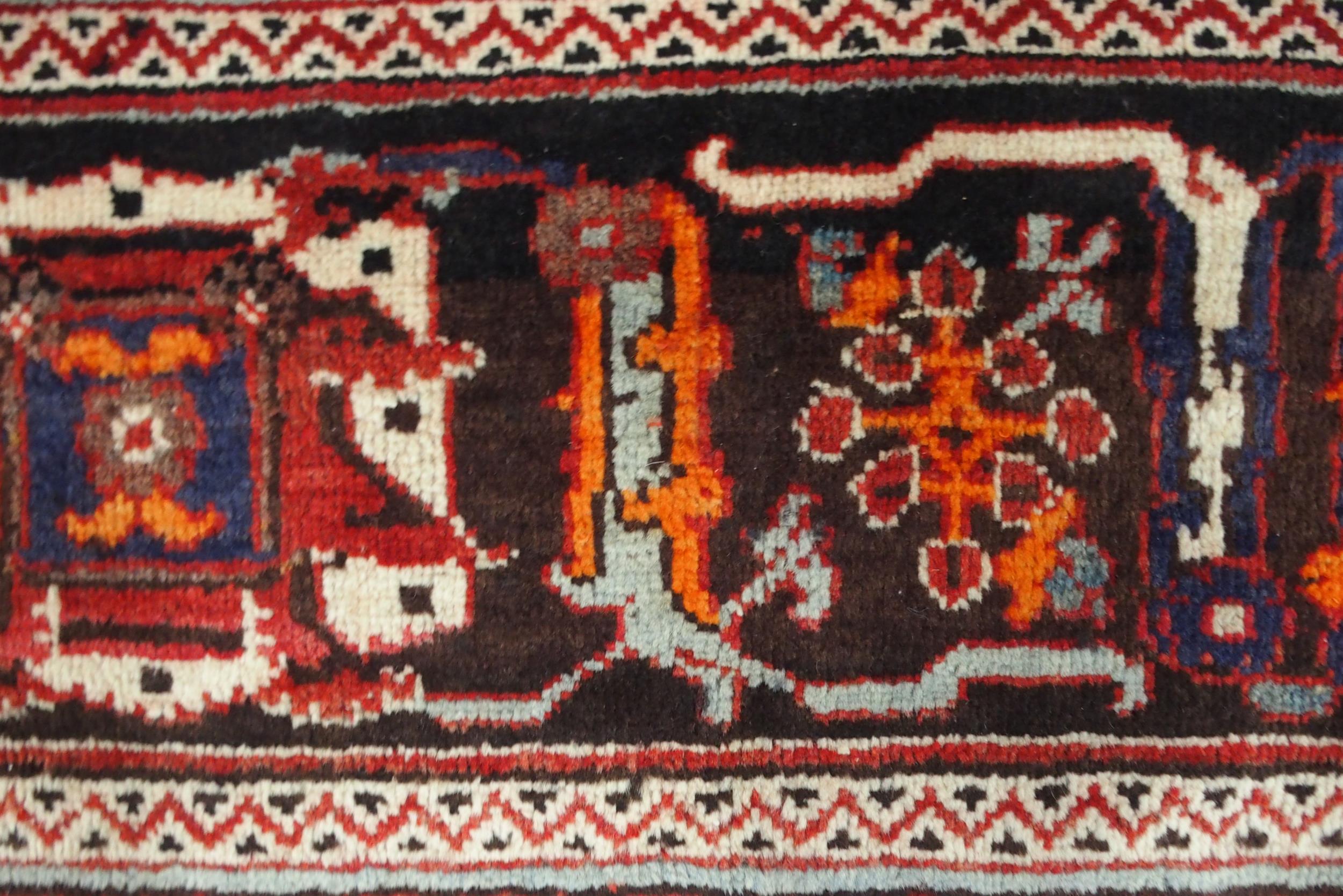 A RED GROUND MEIMEH RUG with dark blue central medallion, matching spandrels and dark blue flower - Image 10 of 10