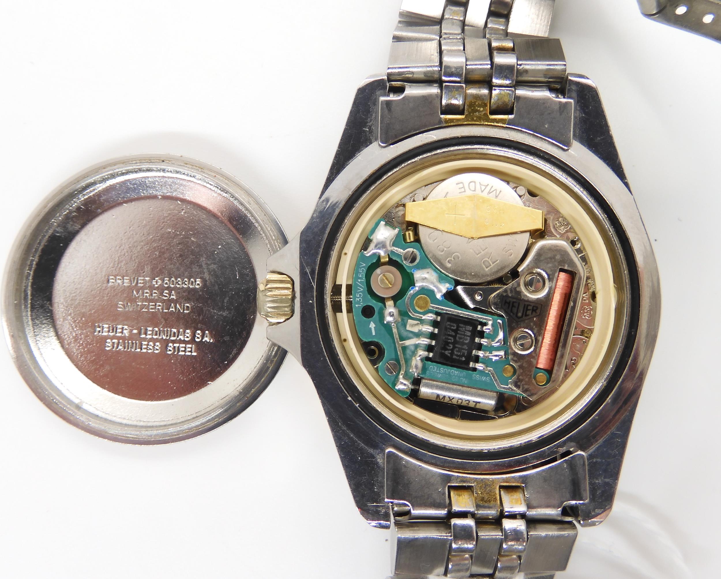 A VINTAGE HEUER WRISTWATCH circa 1983, steel and gold plate diver's watch.  The watch has a black - Image 10 of 11