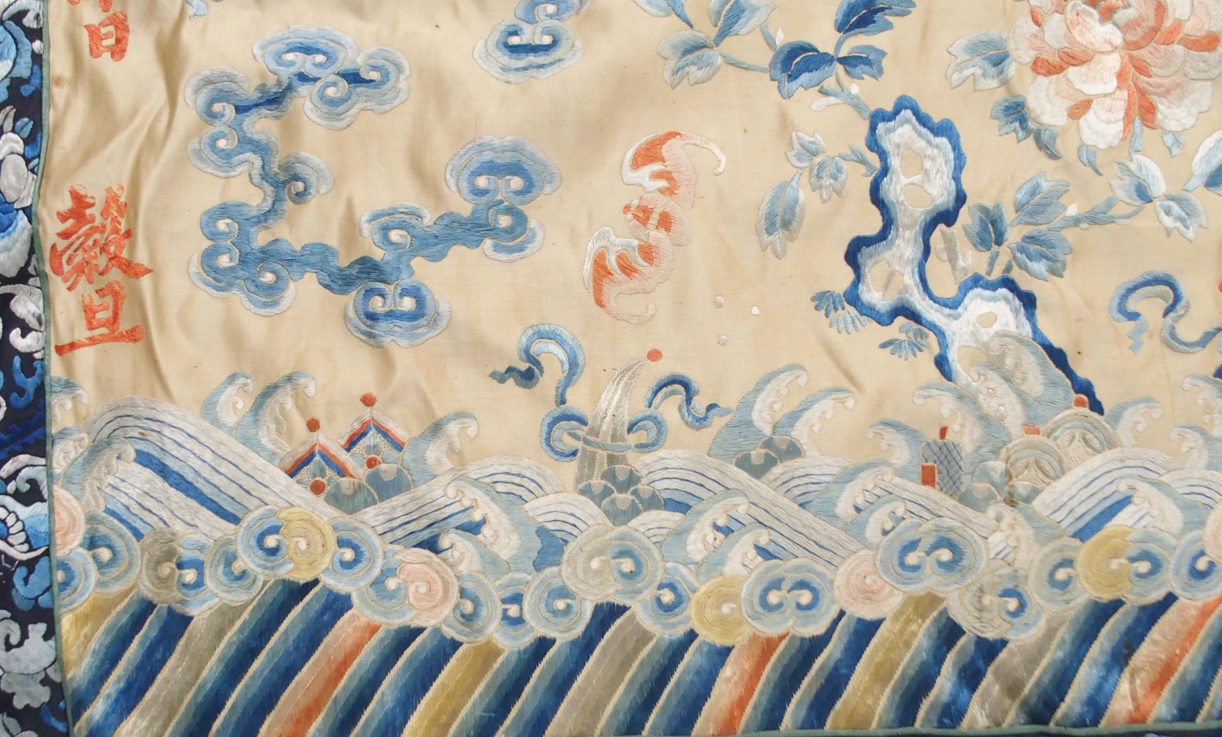 A CHINESE SILK PANEL decorated in coloured threads on a cream ground within a blue and white - Image 4 of 27