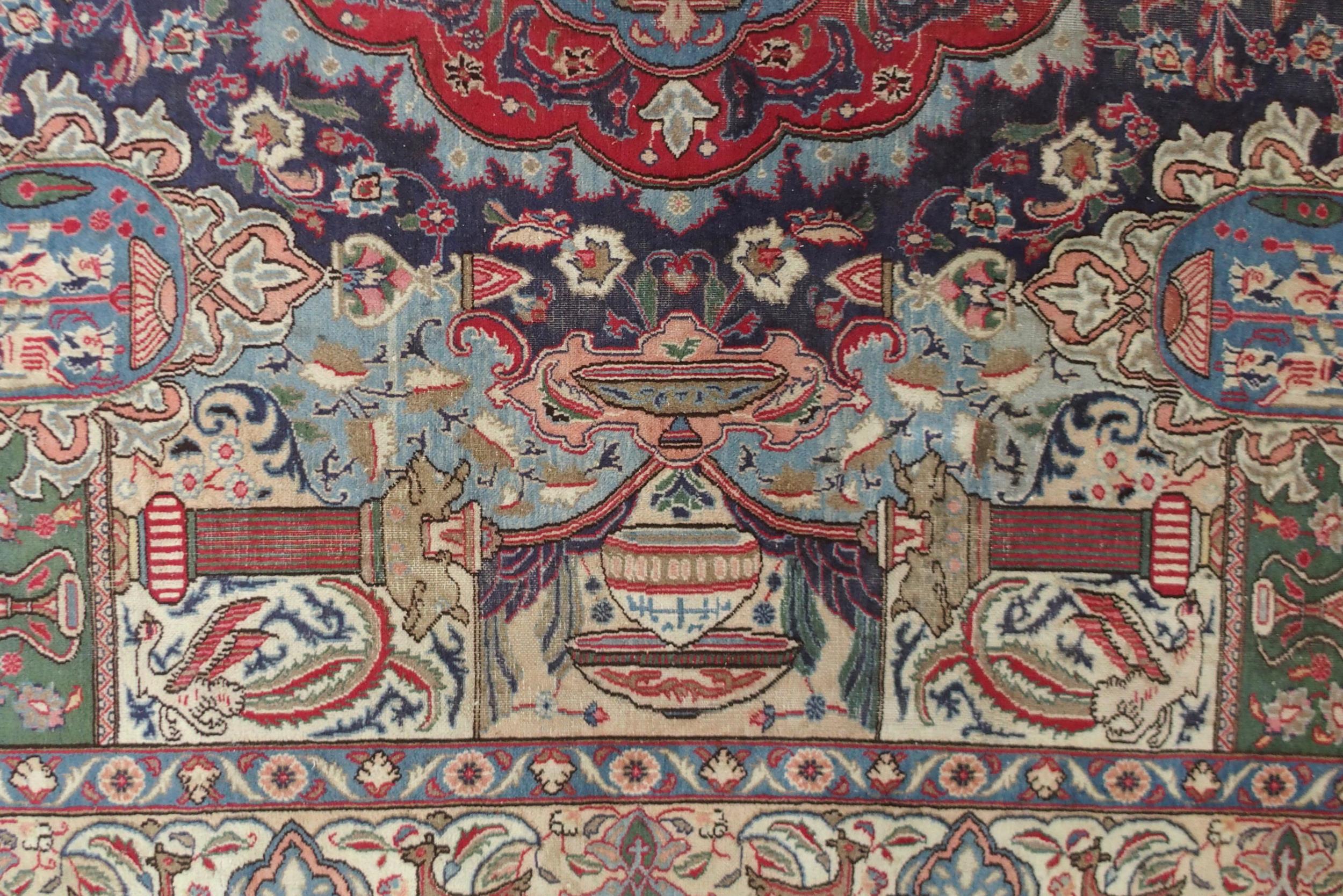 A MULTICOLOURED GROUND KASHMAR RUG with red and blue central medallion upon an extensively decorated - Image 4 of 10