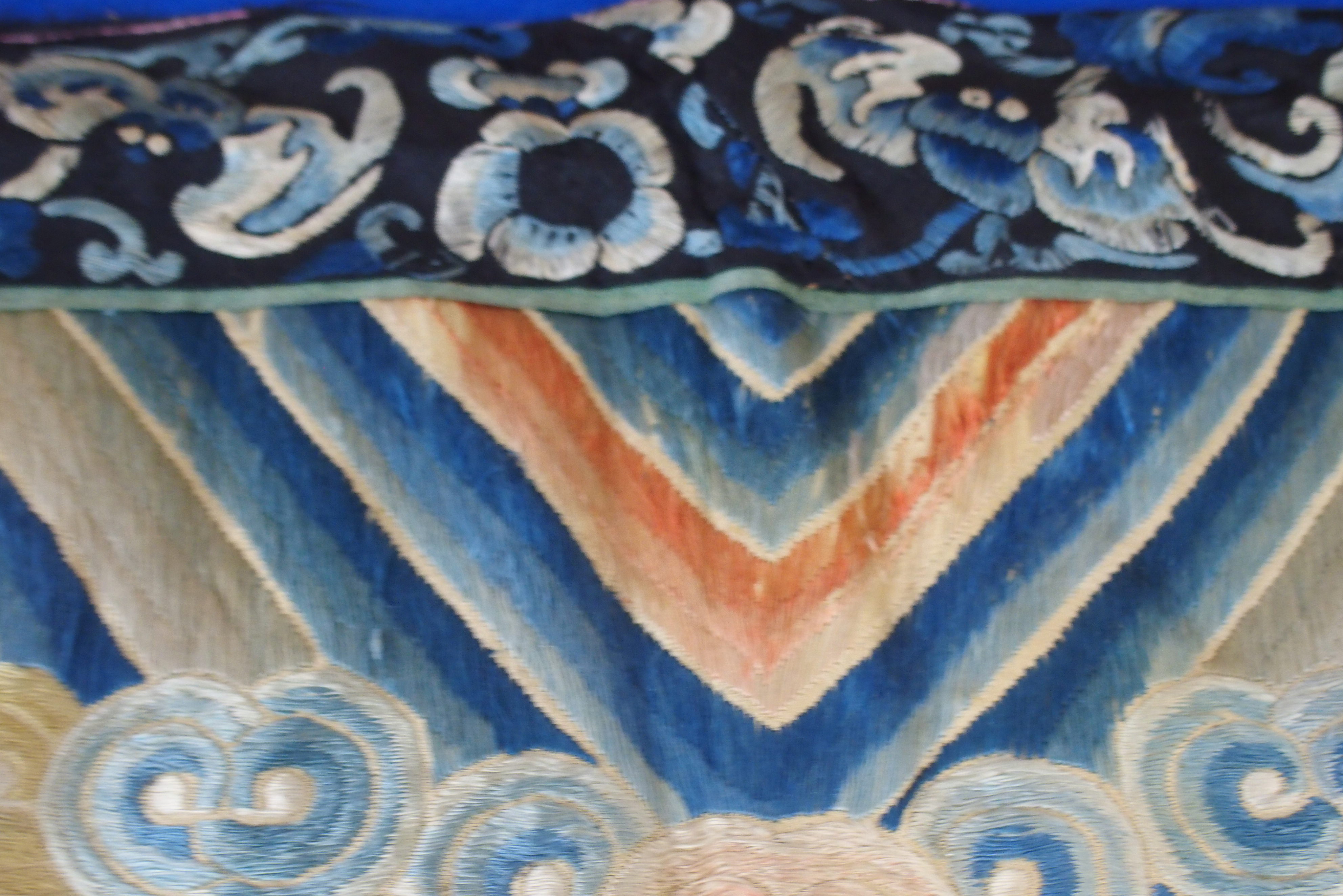 A CHINESE SILK PANEL decorated in coloured threads on a cream ground within a blue and white - Image 26 of 27