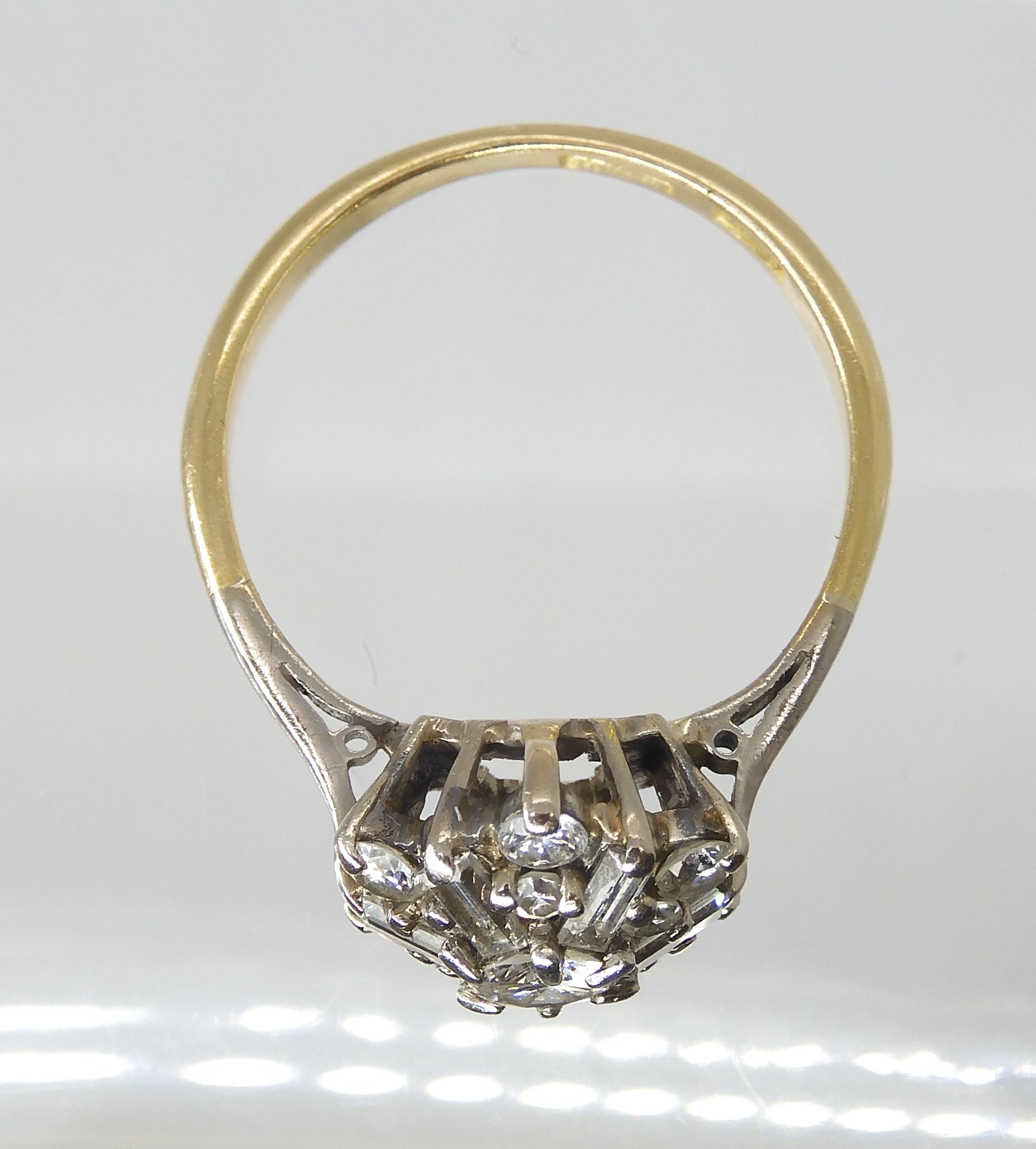A DIAMOND CLUSTER RING set with estimated approx 0.68cts of brilliant and baguette cut diamonds, set - Image 3 of 5