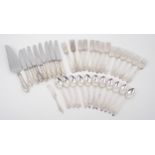 CARTIER; A part-suite of pointed end Sterling cutlery comprising; eight forks, 7.5in, six cake