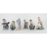 A COLLECTION OF SIX ROYAL COPENHAGEN FIGURES designed by Christian Thomsen including a faun and