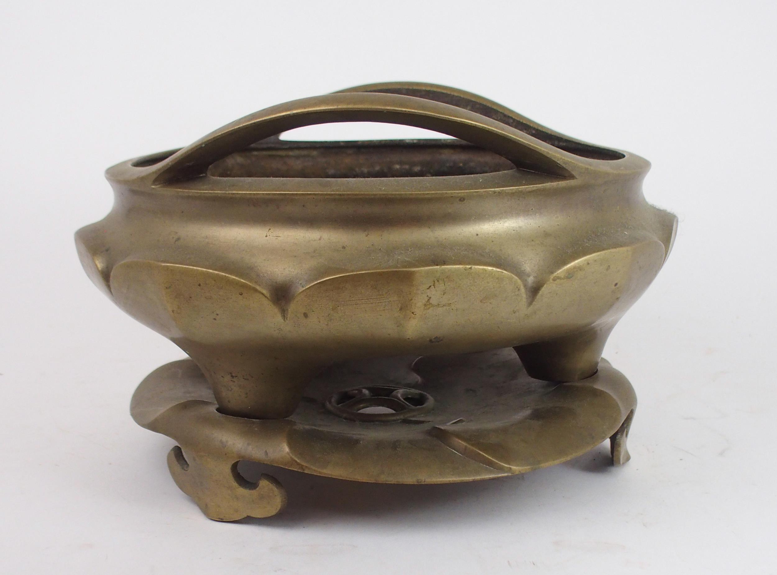 A LARGE CHINESE BRASS CENSER  the raised twin handles above lotus lobed sides and on tripod feet and - Image 2 of 7
