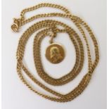 A 64cm curb chain with an Italian 18ct gold pendant of Jesus, weight together 17.4gms (and a base