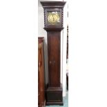 A 20th century stained oak grandmother clock with brass face bearing Roman numerals, 169cm high x
