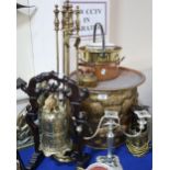 An oriental bell on stand, a brass dog door stop, and assorted copper and brass including fire tools