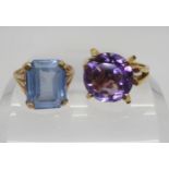 A 9ct retro purple glass gem set ring, size P, together with a 9ct blue glass gem set ring, size