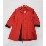 A red Burberry ladies raincoat Condition Report:No condition report available.