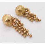 A pair of 18ct gold clip on tassel earrings, weight 12.8gms Condition Report:Available upon request