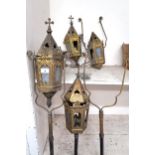 A lot of four 19th century brass Gothic revival ecclesiastical procession lanterns and an assortment