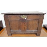 An 18th century oak chest with panelled front and sides, 47cm high x 74cm wide x 36cm deep Condition