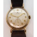A 9ct gold Gents Cyma Cymaflex watch with brown leather strap, monogramed to the back of the case,