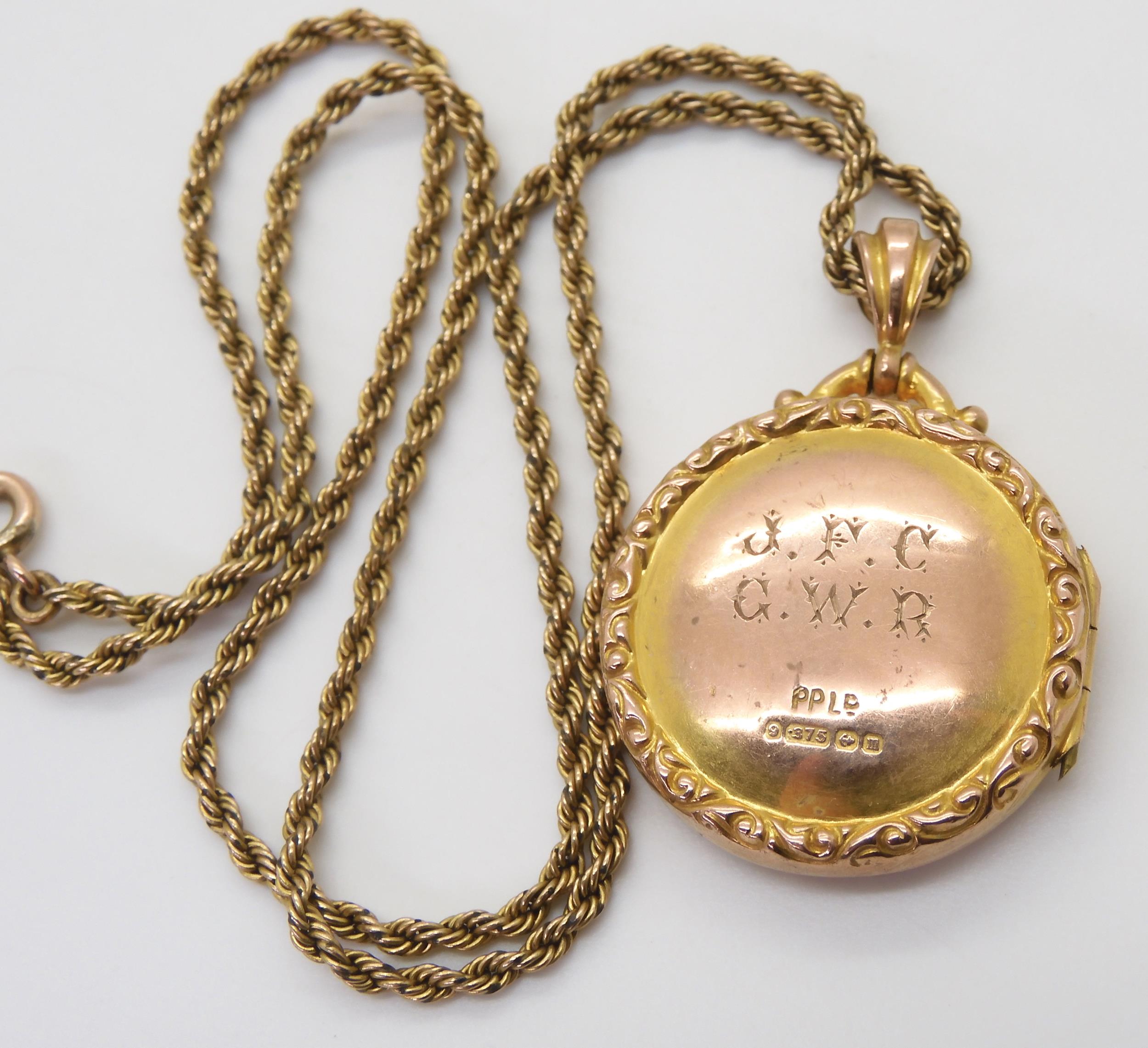A 9ct gold circular locket hallmarked Birmingham 1911, monogram to the back, with a yellow metal - Image 2 of 2
