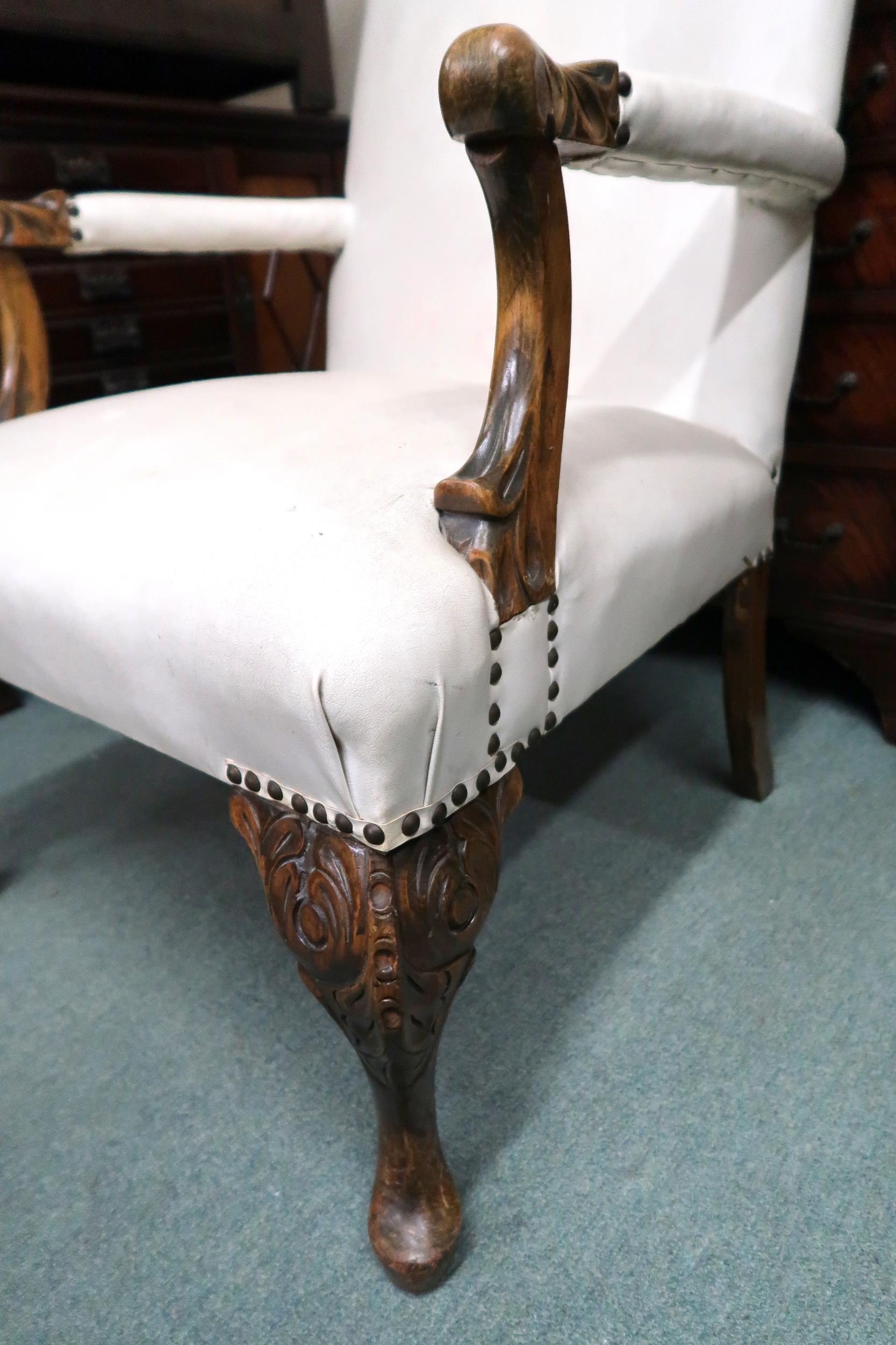 An early 20th century open armchair with white vinyl upholstery on carved cabriole supports, 93cm - Image 2 of 3