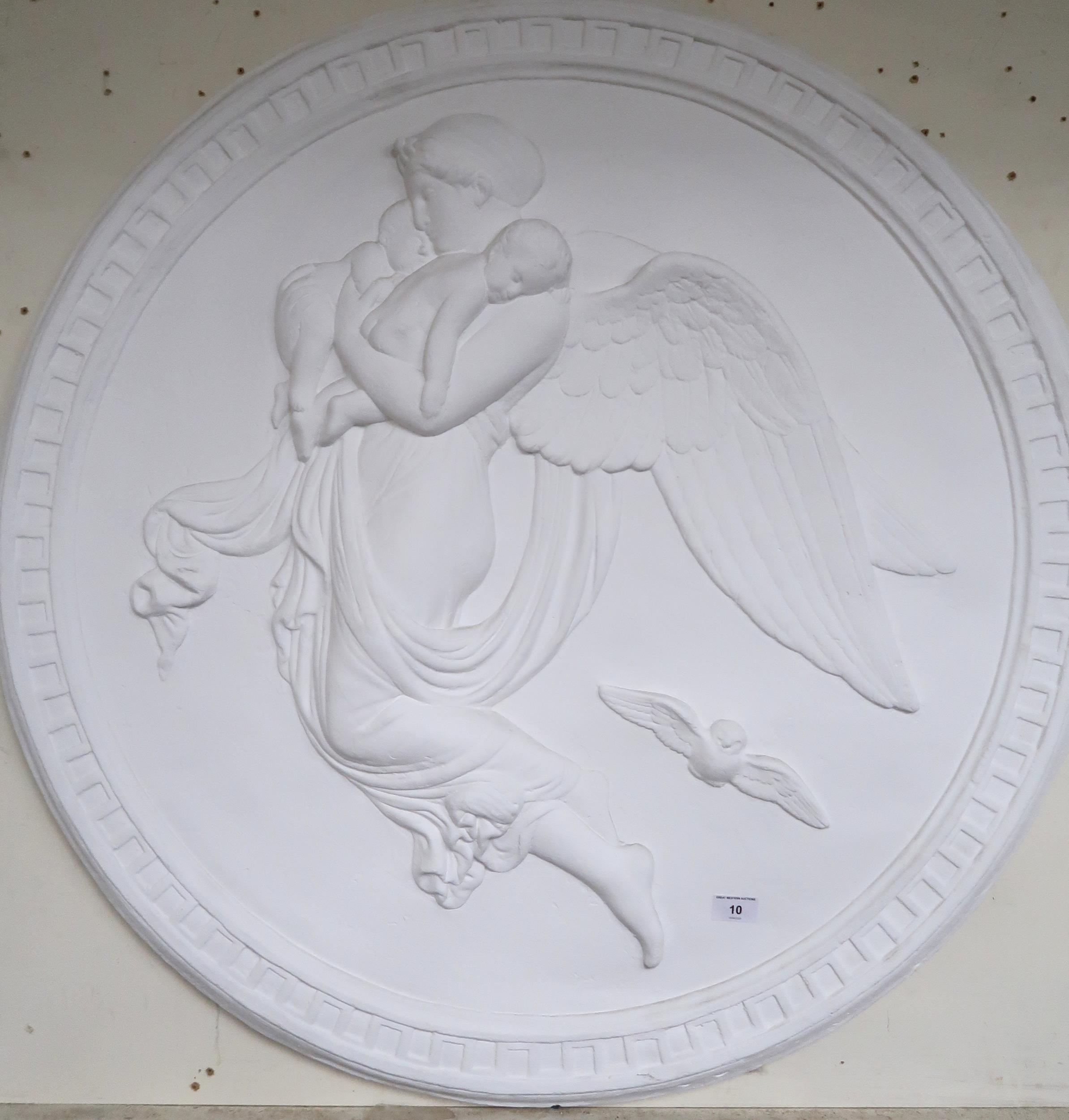 A pair of circular plaster wall plaques depicting angels in flight, 92cm diameter and another - Image 2 of 4