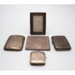 A collection of silver including a small rectangular silver photo frame, by Green & Cradbury Ltd,
