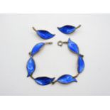 A David Andersen, blue enamelled leaf bracelet and  clip back earrings Condition Report:No condition