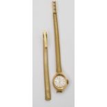 An 18ct gold ladies (af) Bucherer watch and integral strap, weight including mechanism 16.1gms